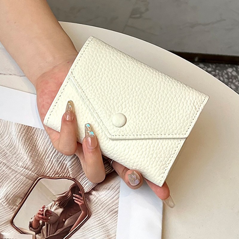 Жіночий шкіряний гаманець Ellie білий - 1 фото